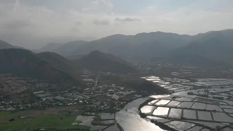 A flying camera flies over the fields that are flooded with water Stock Footage 117437073