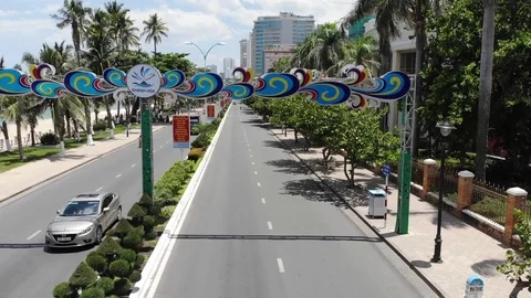 Flying camera flies over the main road of the city of Nha Trang in Vietnam Stock Footage 100187253