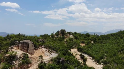 Flying camera flies over the mountains overlooking the city of Nha Trang Stock Footage 100187210