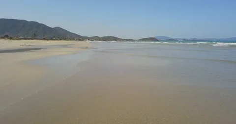 Flying camera flies over the sea and the beach in Nha Trang Stock Footage 128284707