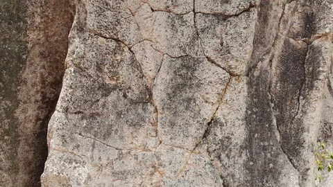 A flying camera shoots a stone on a mountain with a view of Nha Trang Vietnam. 스톡 동영상 100186851