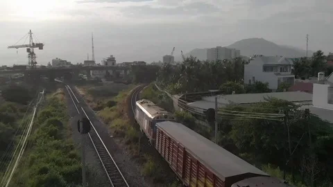 Flying camera shoots like a train in the jungle of Vietnam Stock Footage 116125031