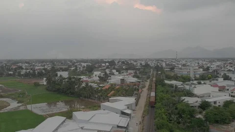 Flying camera shoots like a train in the jungle of Vietnam Stock Footage 117432007