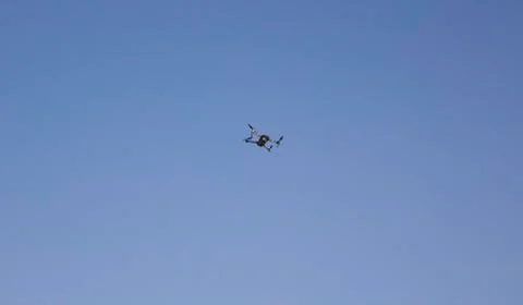 A flying camera in the sky. Stock Photos