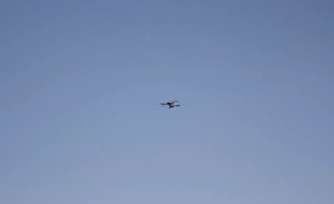 A flying camera in the sky. Stock Photos