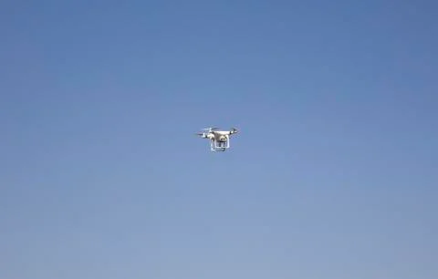 A flying camera in the sky. Stock Photos