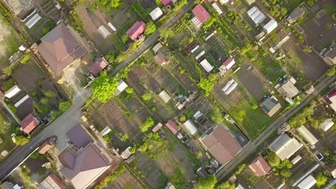 A flying camera takes pictures of the private sector Stock Footage 131132722