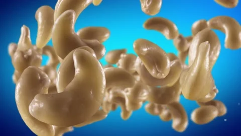 Flying of Cashews in Blue Background Stock Footage 146262234