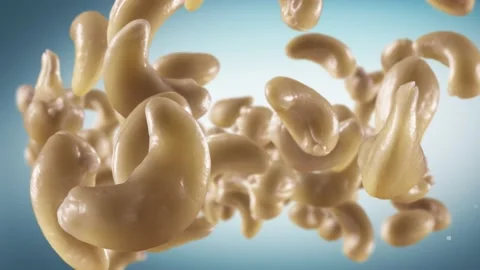 Flying of Cashews in Cyan Background Stock Footage 146261459