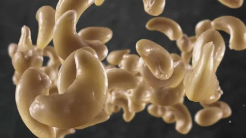 Flying of Cashews in Dark Kitchen Background Stock Footage 146262007