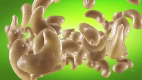 Flying of Cashews in Green Background Stock Footage 146262077