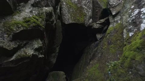 Flying into cave in ravine Stock Footage 126044802