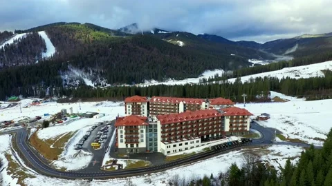 Flying to of the center of Bukovel. In the frame are hotels Stock Footage 202316695