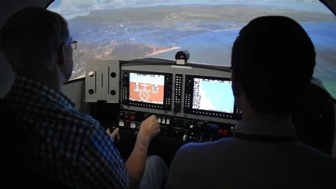 Flying in a Cessna flight simulator Stock Footage 76562367