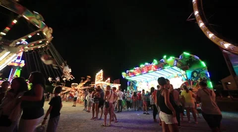 Flying Chairs at Amusement Park, Crowd Stock Footage 65369249