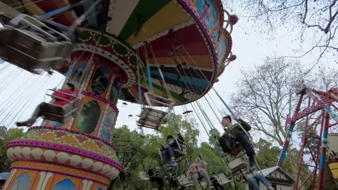 Flying chairs in the playground Stock Footage 253217479