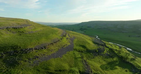 Flying in Chapel Le Dale at sunset Stock Footage 343780825