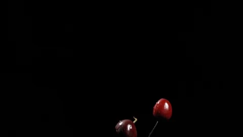 Flying Cherries #1 slow motion 1900fps phantom 4K Stock Footage 120431752