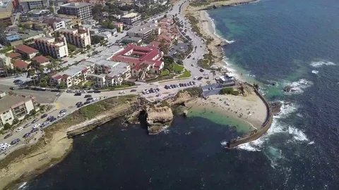 Flying by Childrens Pool Beach in La Jolla, CA, HD Stock Footage 109682421