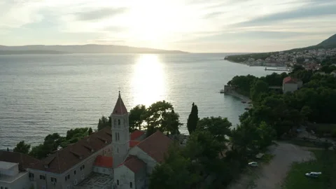 Flying clockwise around bay of Bol on Brac Island Croatia Video stock 142181180