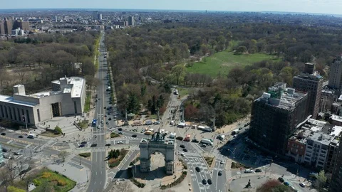 Flying clockwise around Grand Army Plaza with Prospect Park in background Stock Footage