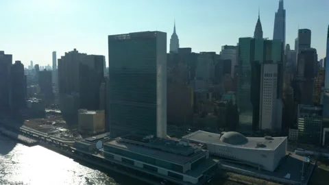 Flying clockwise around United Nations headquarters in NYC Stock Footage 149721540