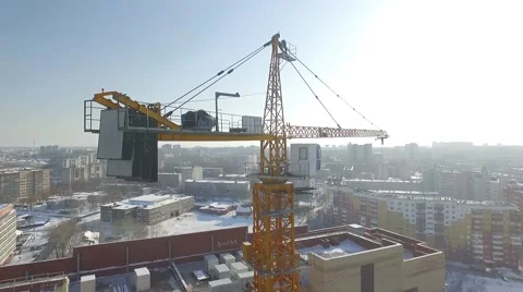 Flying close-up about a construction crane Stock Footage 68938842