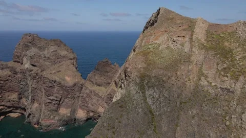 Flying close to the cliff in "Ponta de Sao Lourenco" in Madeira, Portugal Stock Footage 232732693