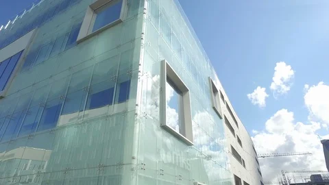 Flying close to the glass building Stock Footage 121660418
