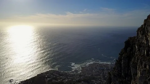 Flying Close To Mountain Wall With View On City And Ocean [Drone Footage] Stock Footage 90935257