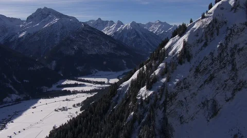 Flying close over trees on a mountain ridge Stock Footage 101897479