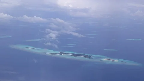 Flying close over tropical sandy islands, Indian Ocean, Maldives Stock Footage 87725469