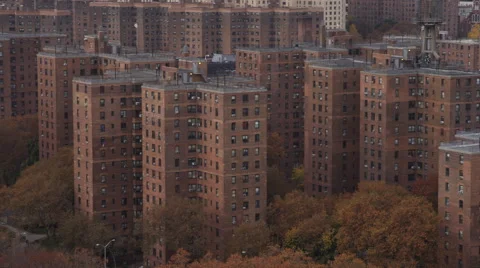 Flying close past apartment buildings of New York's East Side Projects. Shot in Stock Footage 59169659