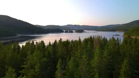 Flying Close To Trees With Beautiful Lake In Background 4K Areal Stock Footage 249905226