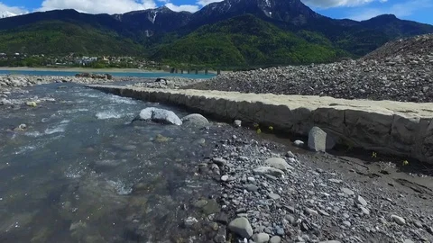 Flying close to waterfall &amp; rock towards bridge 動画素材 106768333