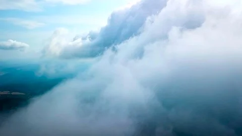 Flying in the clouds 4k Stock Footage 91397251