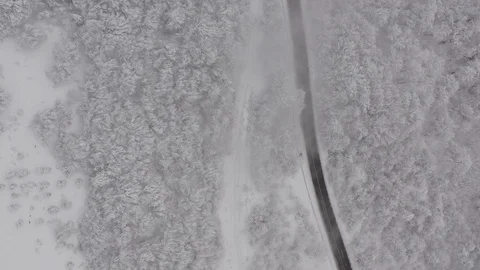 Flying in the clouds above snowy mountain, Georgia (country) Video stock 124927477