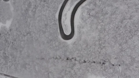 Flying in the clouds above snowy mountain, Georgia (country) Video stock 124928045