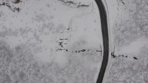 Flying in the clouds above snowy mountain, Georgia (country) Video stock 124929336