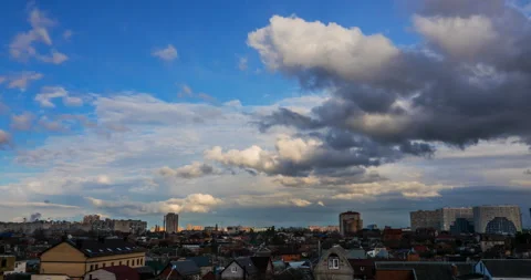 Flying clouds against the setting rays of the sun Stock Footage 105790635
