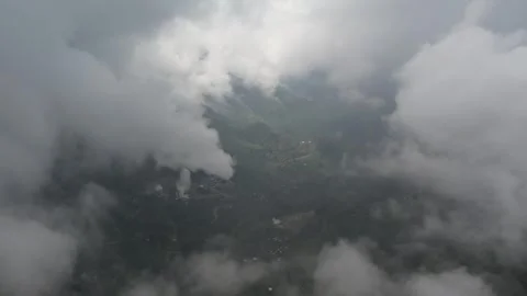 Flying in clouds and fog in a rain forest on a tropical mountain island 库存影片 243716574