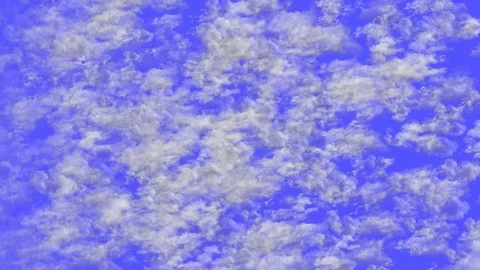 Flying clouds on the blue sky - high density Stock Footage 129649840