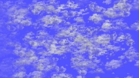 Flying clouds on the blue sky - medium density Stock Footage 129649847
