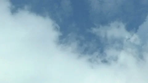 Flying in the clouds, camera movement through the clouds, video loop Video stock 99733165