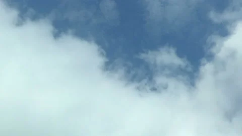 Flying in the clouds, camera movement through the clouds, video loop Video stock 99734203