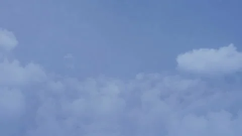 Flying in the clouds, camera movement through the clouds, video loop Video stock 100116276