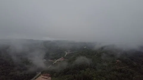 Flying up into the clouds during sunrise. Stock Footage 80017416