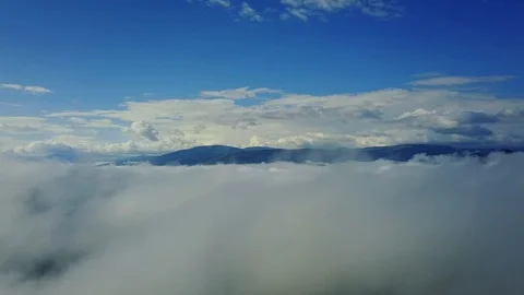 Flying in the clouds 스톡 동영상 87621906