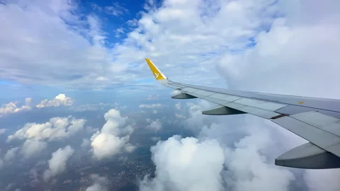 Flying In The Clouds Stock Footage 244220085