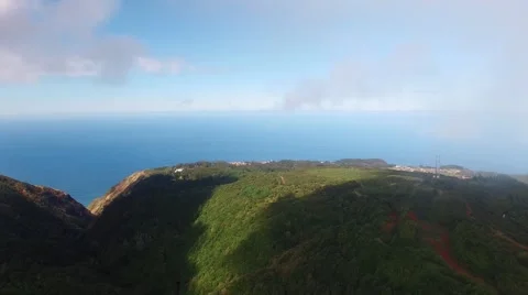 Flying in clouds over mountains and forest of Madeira, Portugal aerial view Stock Footage 68447088